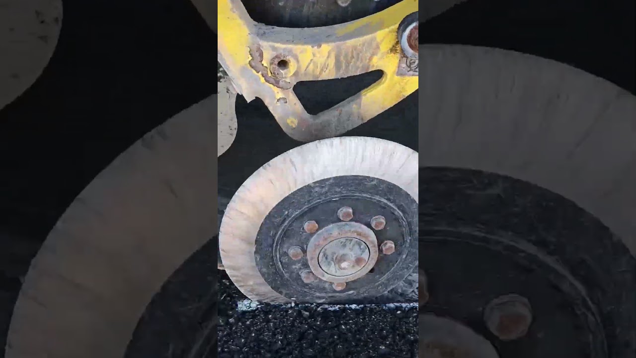 Edge Shaping Of An Asphalt Road Curb Cutting Process