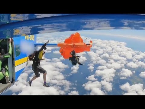 Skydiver narrowly escapes disaster after parachute gets caught on plane