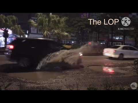 Oblivious drivers hitting HUGE potholes (Compilation)