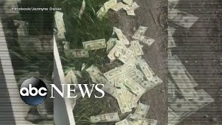 Armored truck spills money on highway