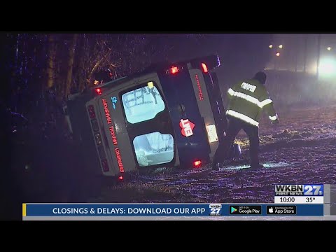 Ambulance crashes off slippery Route 11 roadway