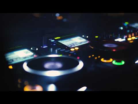 Close up of a dj playing music at nightclub 836