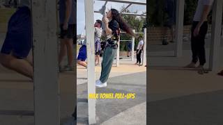 Fitness girl doing towel pull-ups ?gym motivation