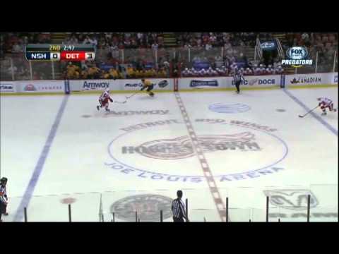 Brian Lashoff beats Mike Fisher to the loose puck then stays with him on the one on one