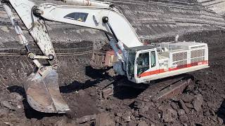 White Cat 385C Excavator Loading Coal On 4 Axle Mercedes & MAN Trucks - Interkat SA
