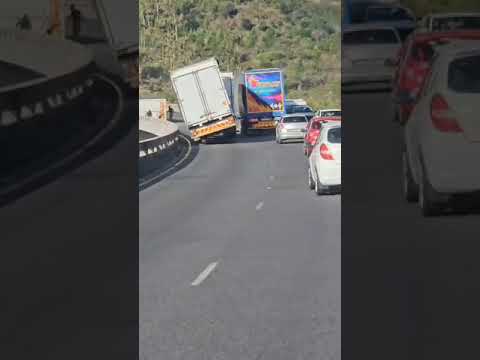 Wind Blows Truck Trailer off a bridge in Cape Town Paarl