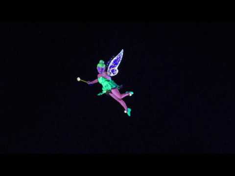 Tinkerbell flies during Firework Show Disneyland California