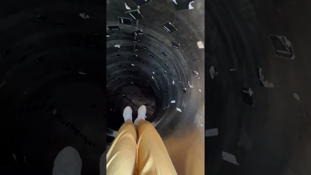 Girl goes down a slide in Sephora in Barcelona!