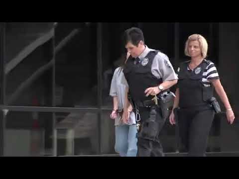 Shackled Prisoner Escorted in Public