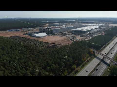 Big Factory Structure under construction in rural landscape of Germany near Berlin, Gigafactory by