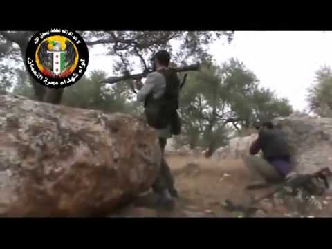 اشتباكات بين لواء شهداء معرة النعمان وقوات النظام أثناء التصدي للرتل القادم إلى وادي الضيف