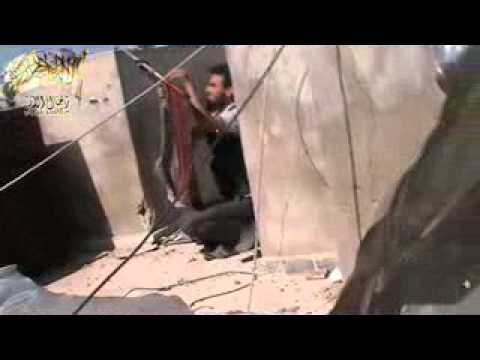 تمركز عناصر لواء رجال الأثر في احد الأبنية التي كان يتمركز فيها عناصر النظام في حي جوبر في دمشق