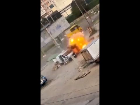 Video shows drone chasing man round van before exploding