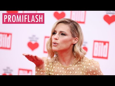 Single Michelle Hunziker wird von vier Männern umschwärmt