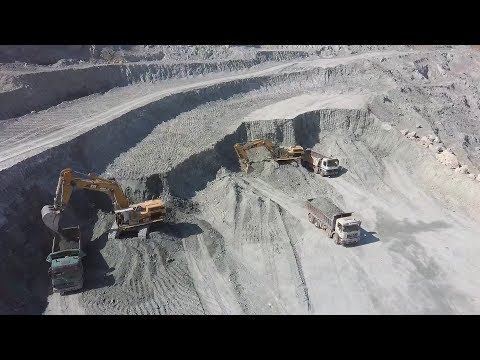 Caterpillar 390D Excavator Caterpillar 385C And Caterpillar 365B Loading Trucks - Pyramis Ate