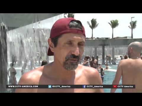 Man-made beach in Rio's poorer north part of Olympic rehab