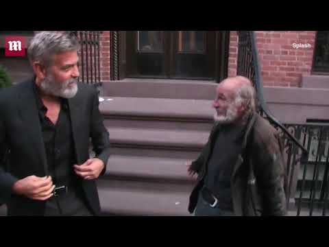 Video: George Clooney greets ex-hobo 'Radioman' while out with Amal