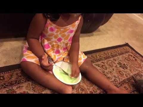 Reeva eating ice cream with hand