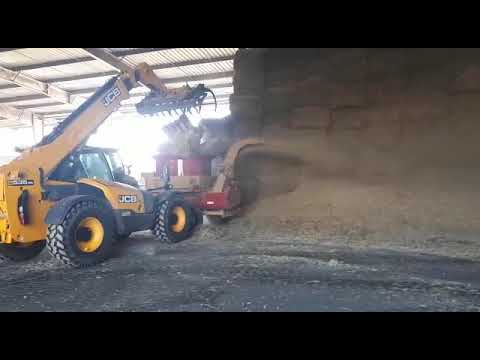 HayBuster H-800 grinder working in Poland