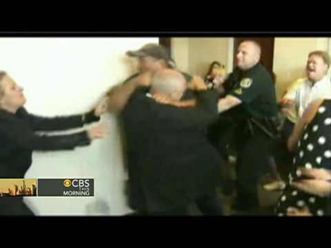Families in murder case brawl outside courtroom
