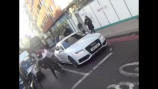 Video: Watch 'aggressive' car passenger punch cyclist in London road ...