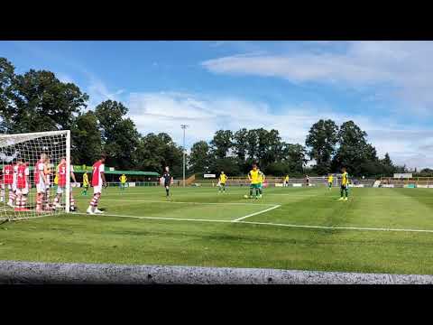 Hitchin Town taking free kick against arsenal under 21