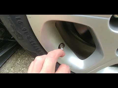 Quickly fix a leaking tire valve stem core on a car tire.