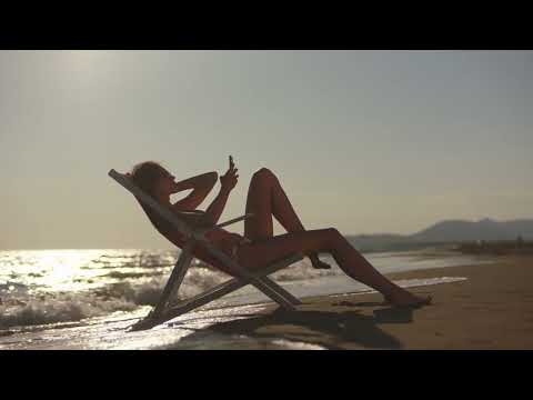 Free Video Clips And Footage - Woman, Sunbathing, Beach, Sitting