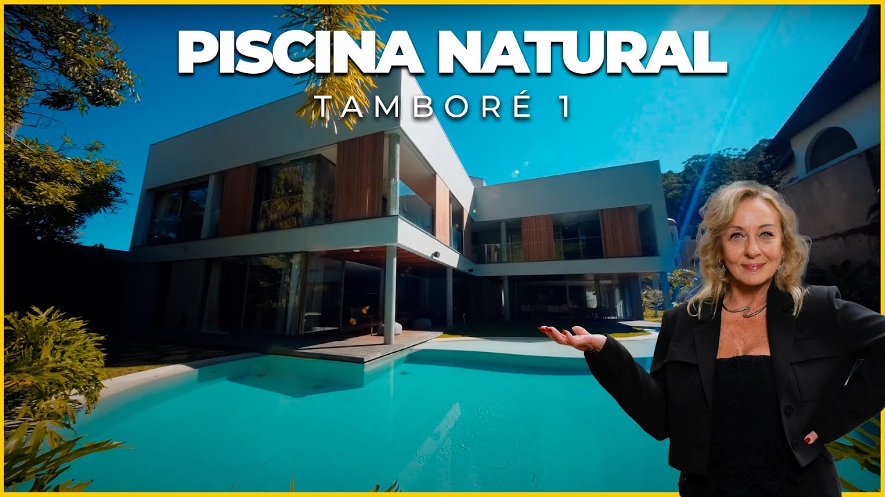 Residência autoral de David Bastos com piscina natural e design brasileiro