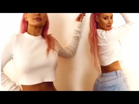 Iggy azalea flaunts her voluptuous in Figure hugging jeans