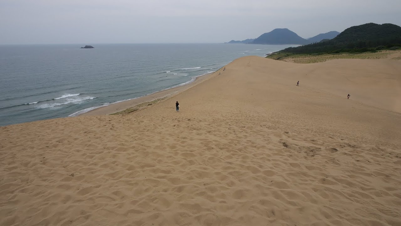 Immersive street-level walking tour through Tottori Sand Dunes, Japan, showcasing authentic urban landscapes, local architecture, and the vibrant atmosphere of the city's neighborhoods