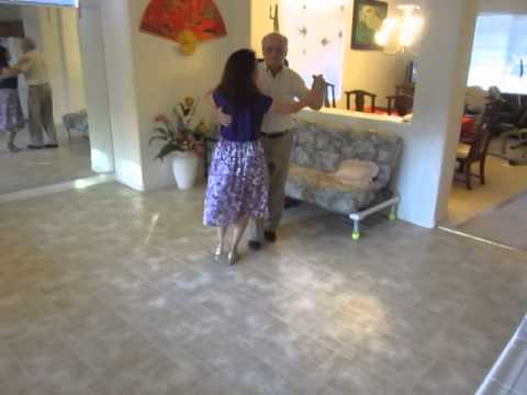 Joe and Leanne dancing the waterfall cross-step waltz figure