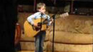 Kid plays Johnny Cash at the Carter Fold