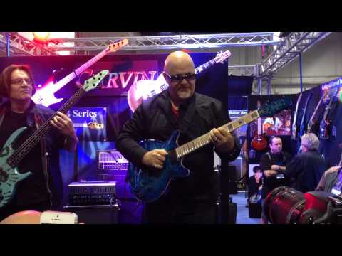 Frank Gambale and Bunny Brunel Carvin Booth 2014 NAMM - GuitarLessons.com