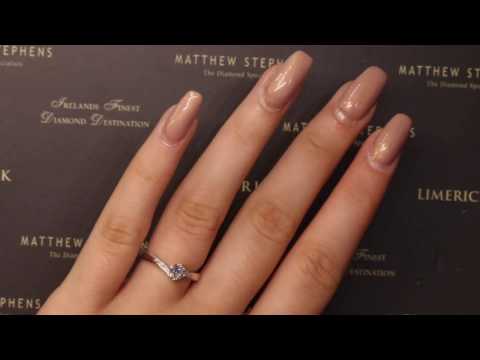 38260 - Four Claw Solitaire NSEW With Diamond Set Twist Detail T0.56ct