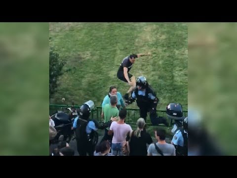 Romanian Protester Kicks A Police Officer In The Back Really Hard