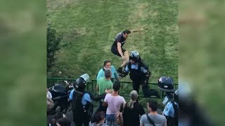 Romanian Protester Kicks A Police Officer In The Back Really Hard
