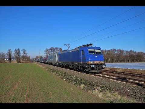 Beacon Rail 185 595-6 und RTB Cargo 185 684-8 mit Autotransportzug bei Bruchköbel