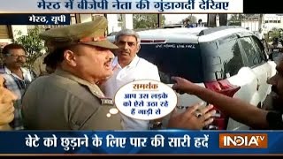 Video: BJP leader Fight with meerut police on the road in UP video