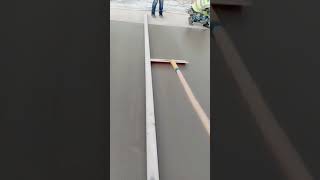 Concrete surface finishing for road construction