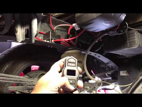 Air Lift 25870 WirelessONE Compressor System With Firestone Airbags on a 2015 Tundra
