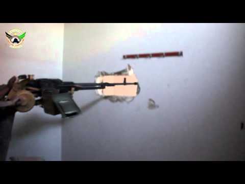 استهداف تحصينات قوات النظام في حاجز الزعلانة في جبهة وادي الضيف في ريف ادلب بواسطة رشاش 12 من قبل لواء مغاوير التوحيد