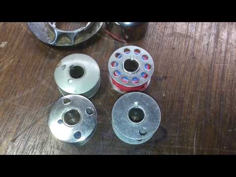 Part of a video titled Singer Class 15 vs Class 66 bobbins. - YouTube