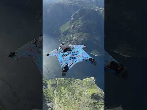 Wingsuit base jump off norway cliff
