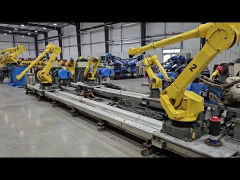 Dual FANUC M-710ic/20L Industrial Robots With 35 Foot Track - F101752