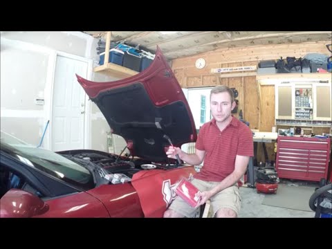 Upgrading spark plugs, plug wires, and plug wire heat insulators in an LS1 C5 Corvette