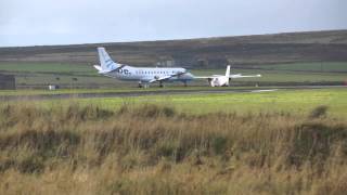 Flybe SAAB 340 landing at Kirkwall Airport, Orkney Islands, Scotland