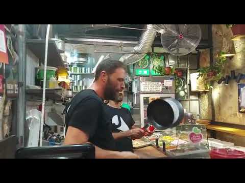 happy at the Jachnun bar Machne Yehuda