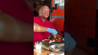 Man attempts a Hot Wings challenge that has to be completed in under 45 minutes!