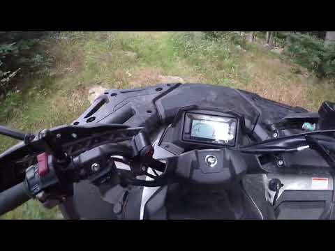 cfmoto 625 in downhill track and powerlines